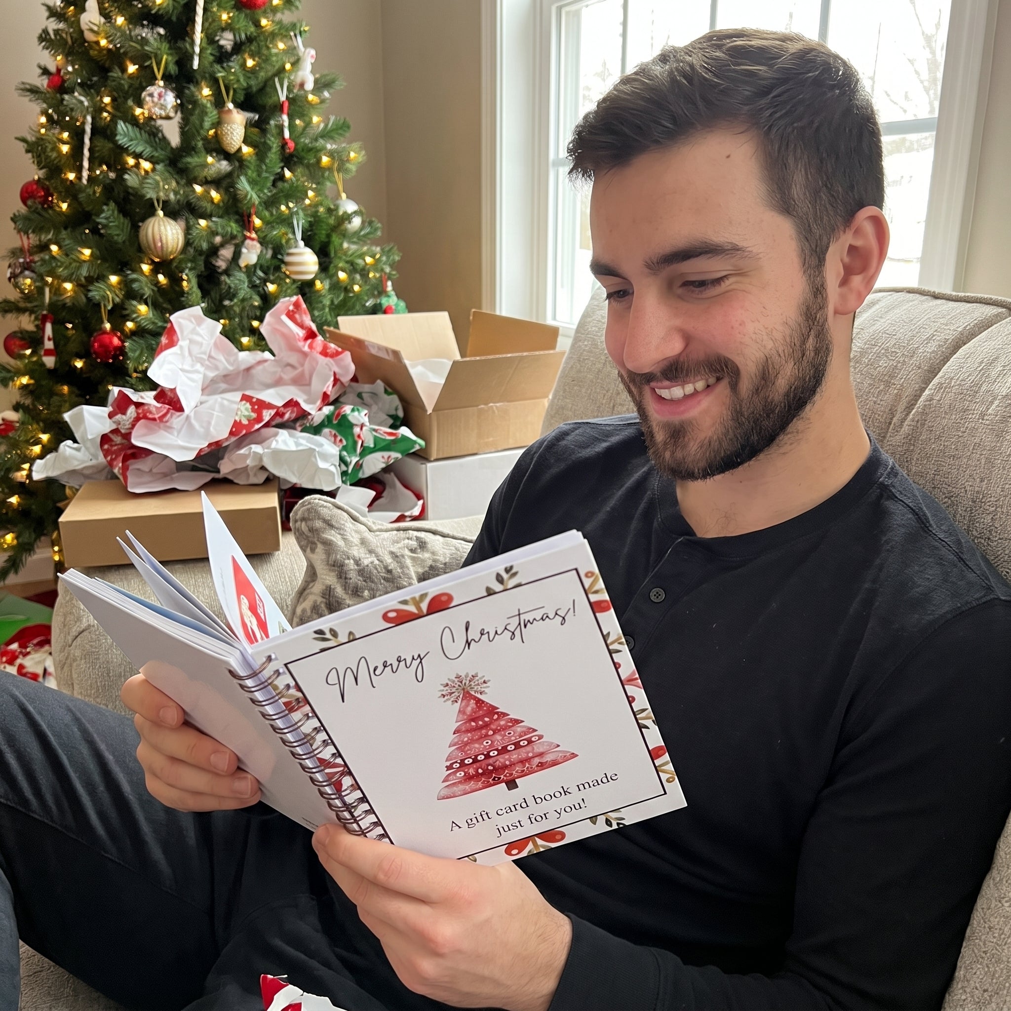 Grown son flipping through the gift card book